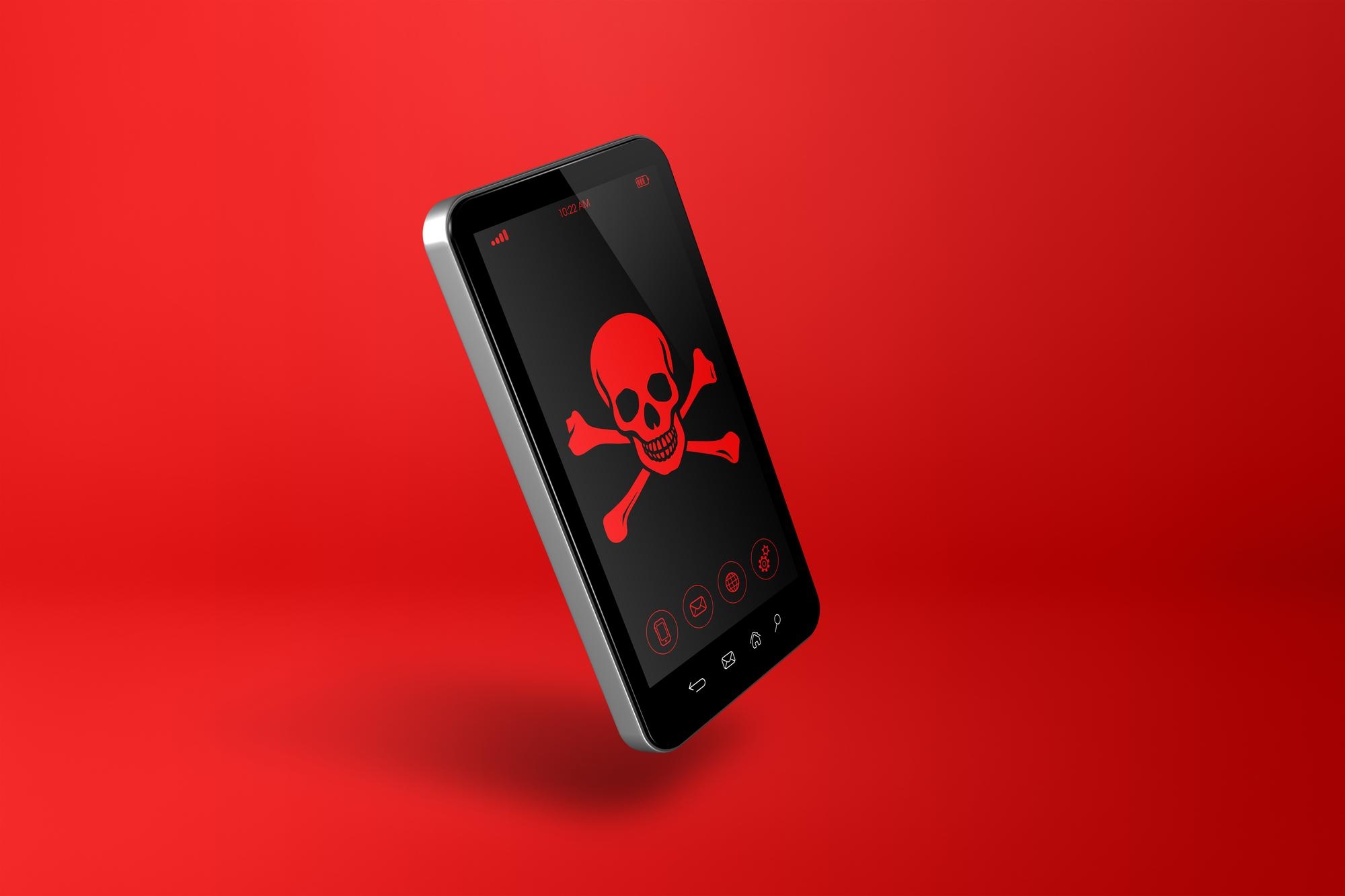 smartphone com logo de pirata no ecrã