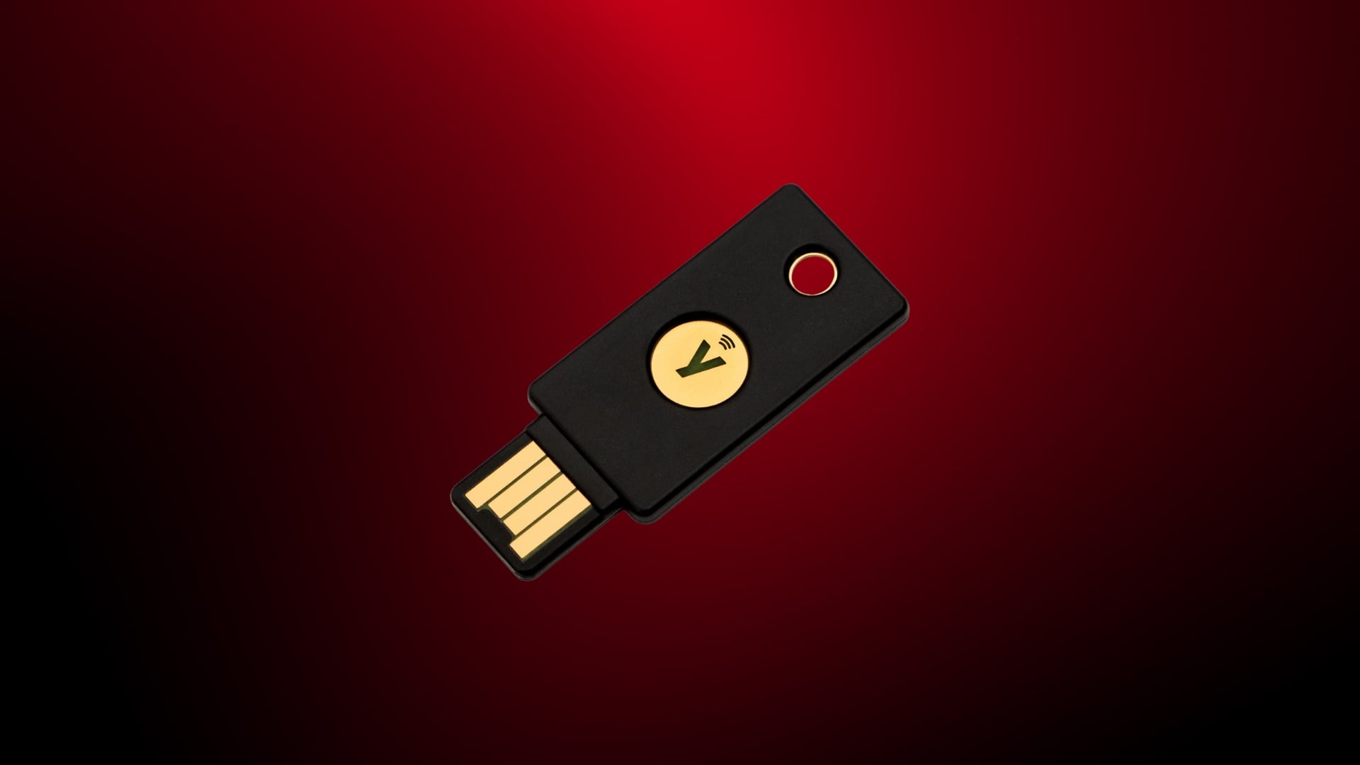 Yubikey em fundo vermelho